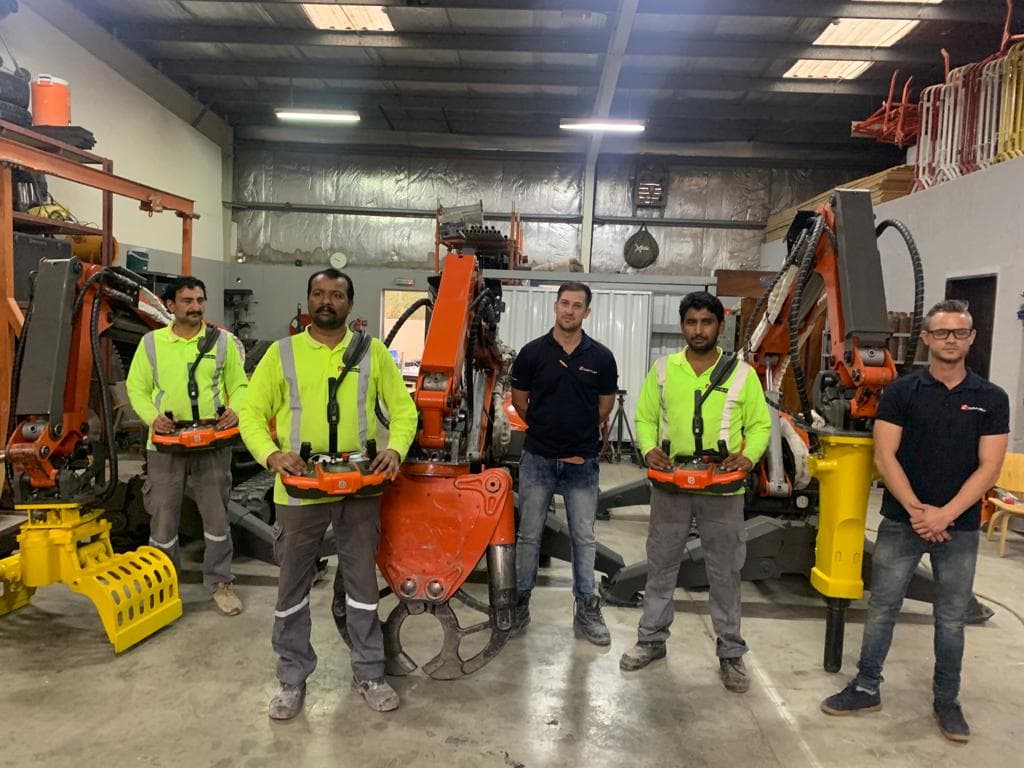 Dem-Quip equipment and operations team with Husqvarna robotic demolition fleet